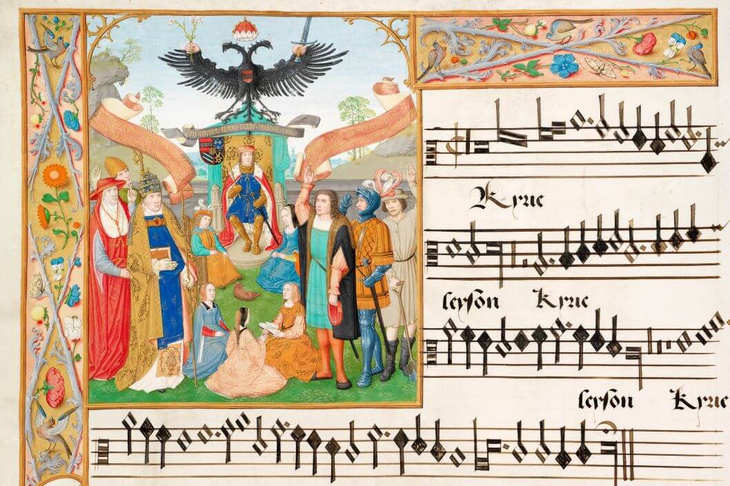 An excerpt from the Mechelen Choirbook, depicting sheet music with lush illustrations in the margins.