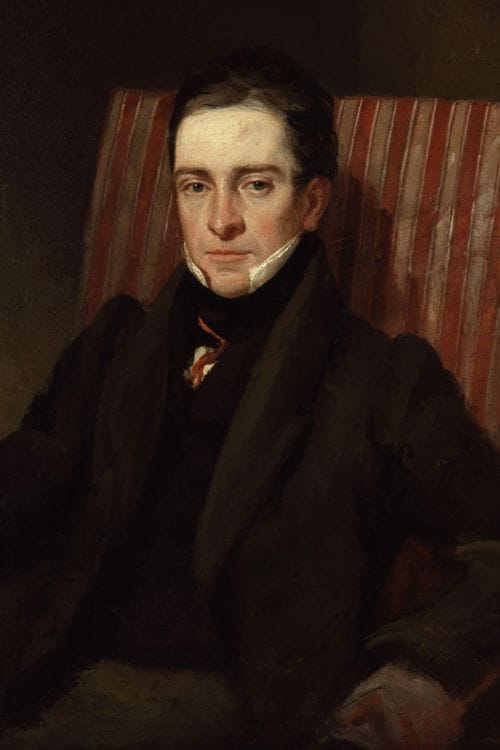 A portrait of the poet Thomas Hood sitting in a chair.